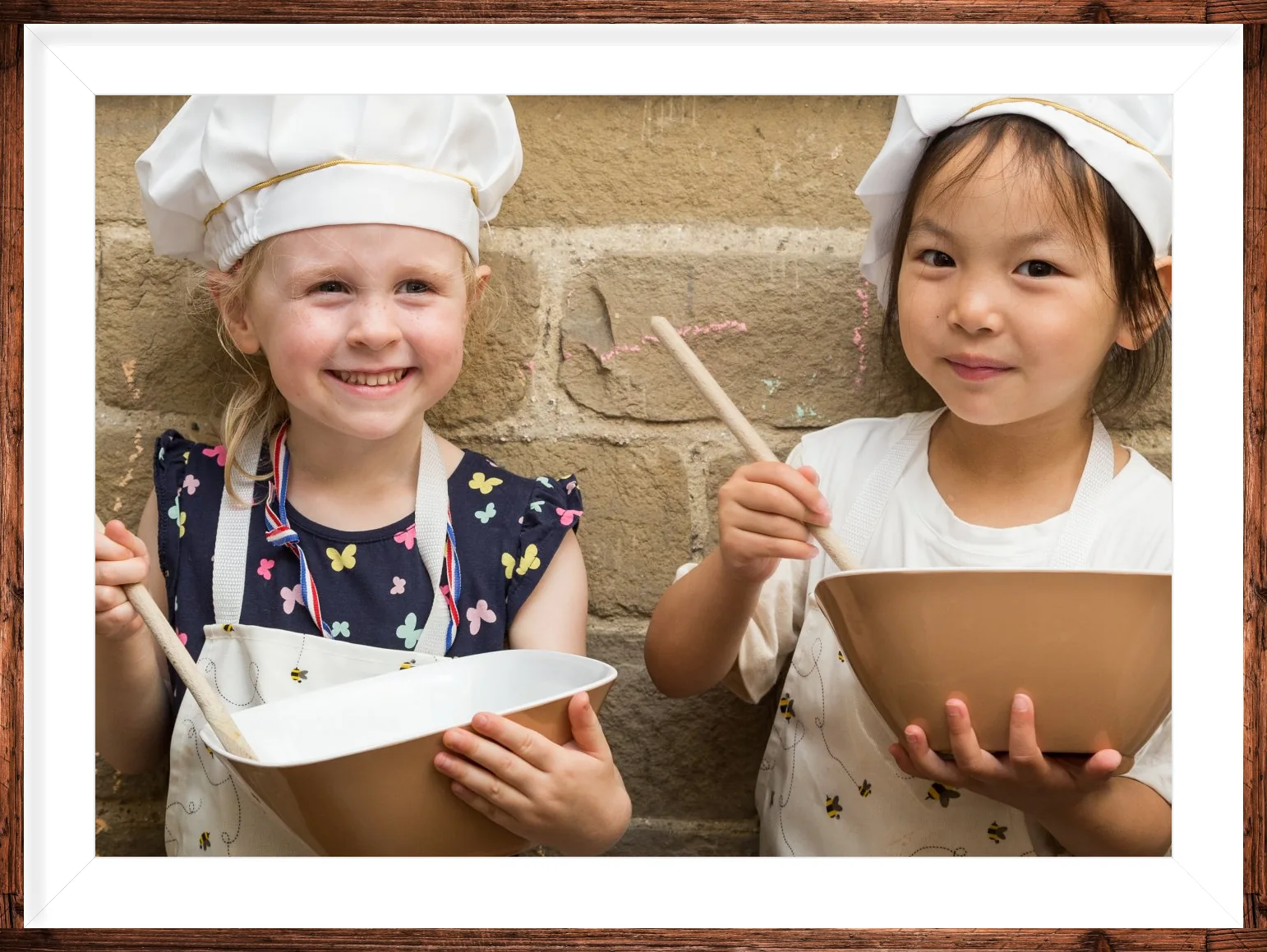 Two Riverside children enjoying a cooking activity