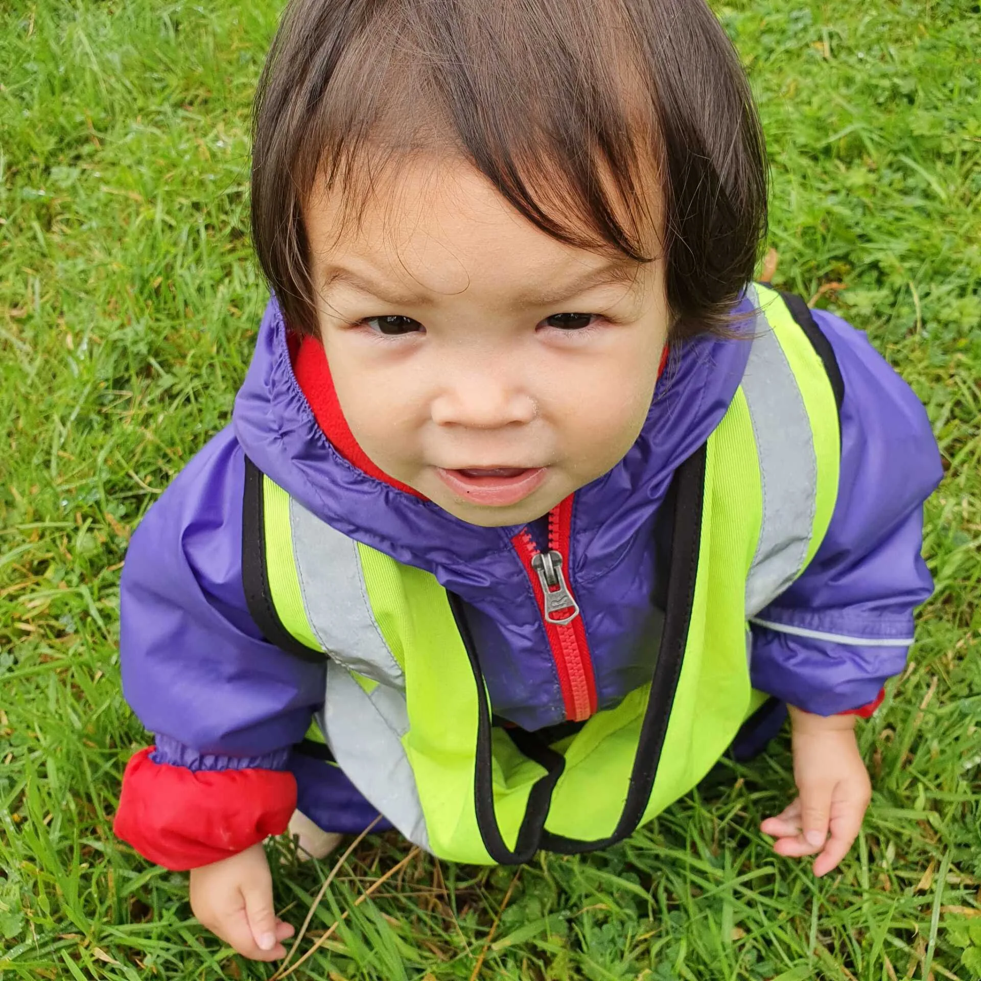 A Riverside toddler exploring outdoors